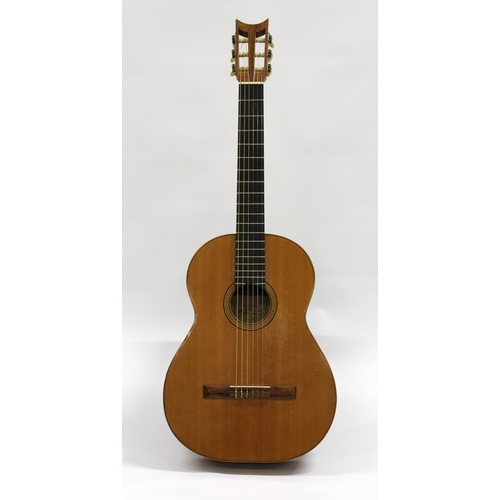 69 - A.A. Jones of Norwich, a classical guitar with original label, signed and dated 1963, with an associ... 