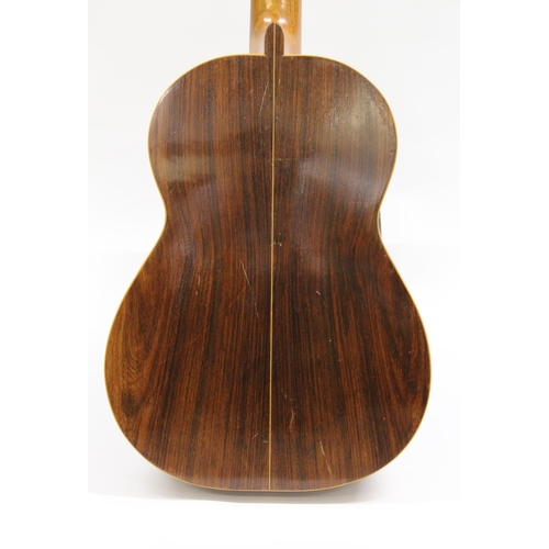 69 - A.A. Jones of Norwich, a classical guitar with original label, signed and dated 1963, with an associ... 