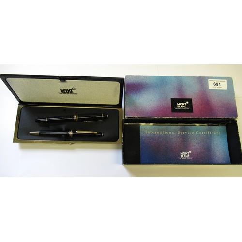 691 - Montblanc fountain and ballpoint pen set, in original box, engraved with the initials J.N.E.