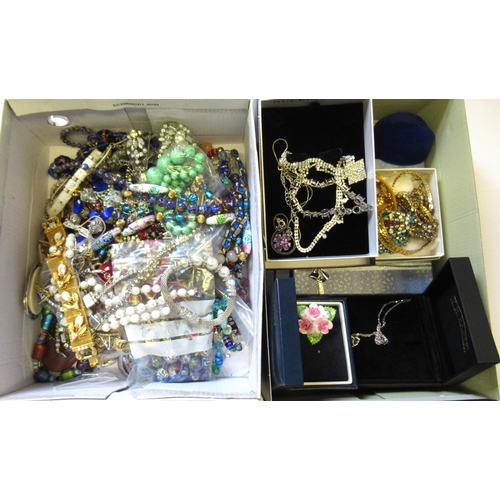 704 - Two boxes of various costume jewellery including boxed