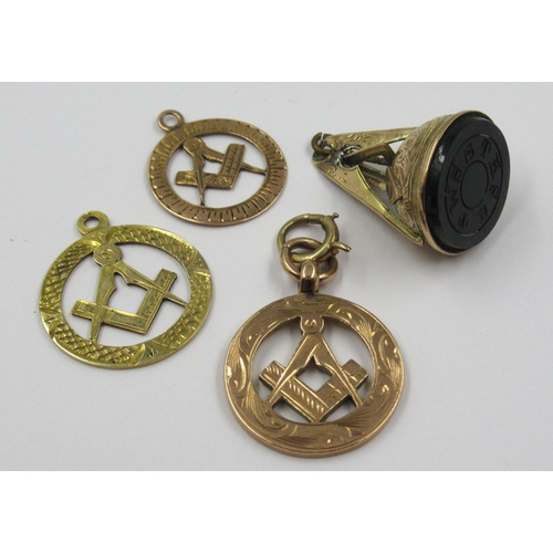 710 - Three 9ct gold Masonic fobs, 7.5g together with a 9ct gold and agate fob seal, 3.2g