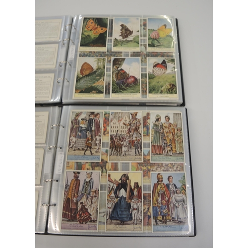 77 - Five albums of Liebig trading cards, mainly later sets