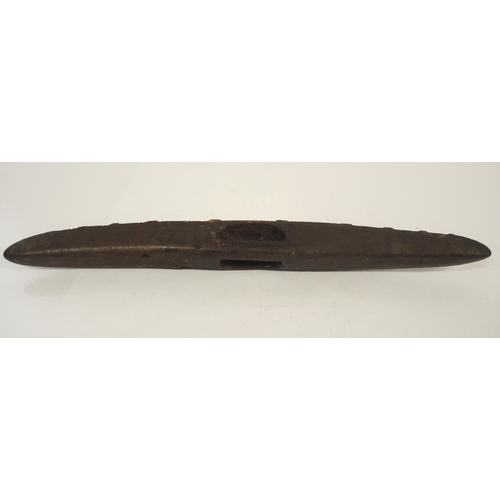 79 - Late 19th / early 20th Century Aboriginal parrying shield with typical carved decoration, 77.5cm lon... 