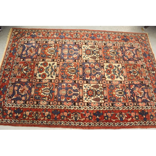 9 - Bakhtiari rug with a garden panel design in shades of red, blue and cream with borders, 202 x 135cm