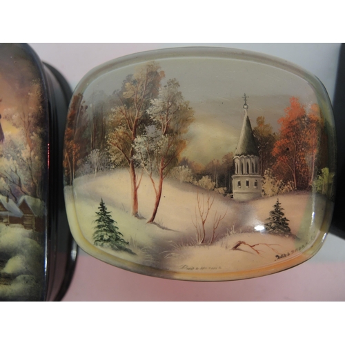 94 - Group of three small 20th Century Russian papier mache boxes, the lids painted with various landscap... 