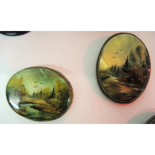 94 - Group of three small 20th Century Russian papier mache boxes, the lids painted with various landscap... 