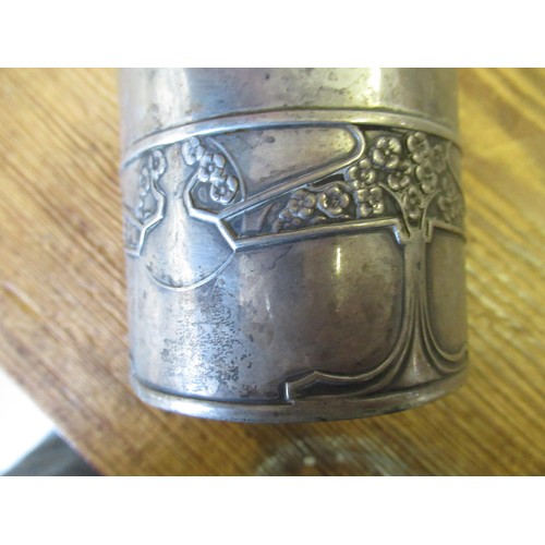 648 - London silver beaker of Art Nouveau design with embossed stylised floral design to the lower half, 4... 