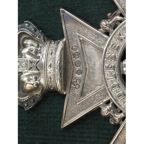 81 - Middlesex Rifle Volunteer Corps Victorian silver badge, hallmarked Birmingham 1888, together with tw... 