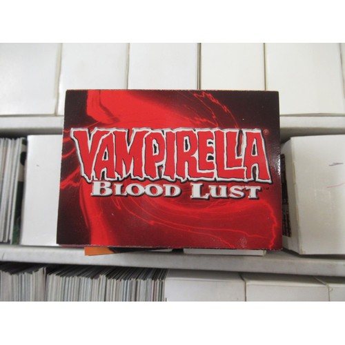 301 - Large box containing Comic Images, including various Vampirella, Heavy Metal etc