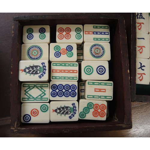 137 - Late 19th / early 20th Century bone and bamboo mahjong set in a brass mounted four drawer case, toge... 