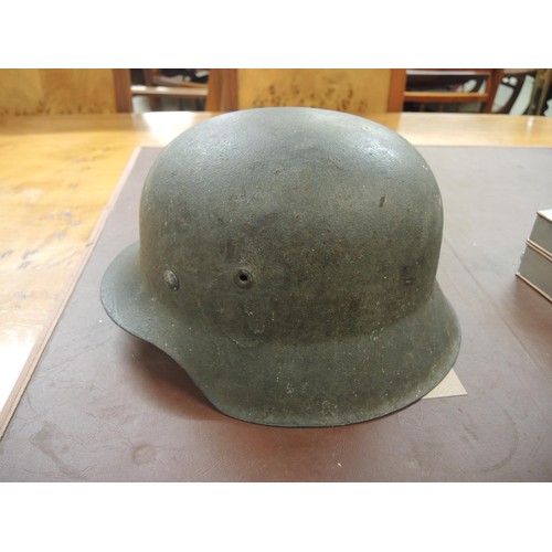 126 - World War II German M42 steel helmet, numbered 12230