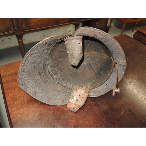 283 - 17th Century type lobster tail steel helmet, together with a similar steel breast plate