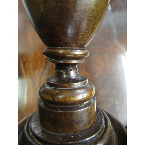 1670 - Pair of late 19th Century mahogany and brass mounted candlesticks in George III style, 46cm high