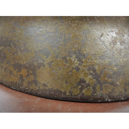 124 - World War II German M35 steel helmet with leather liner