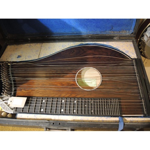 121 - German concert zither by Arcus, in a fitted case, together with another by Hug & Co., Basel, in orig... 