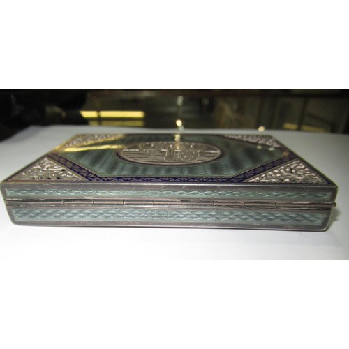 708 - Continental silver rectangular cigarette case with enamelled decoration (damage to enamel)