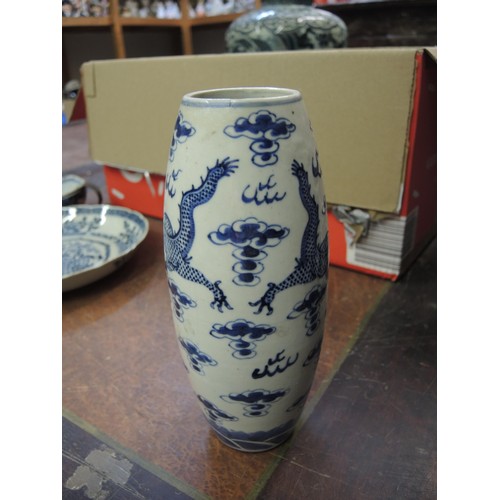 447 - Chinese blue and white dragon decorated vase signed with four character mark to base, together with ... 