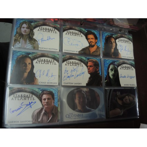 288 - Five albums containing Babylon 5, Stargate Atlantis, and Farscape trading cards, including some auto... 