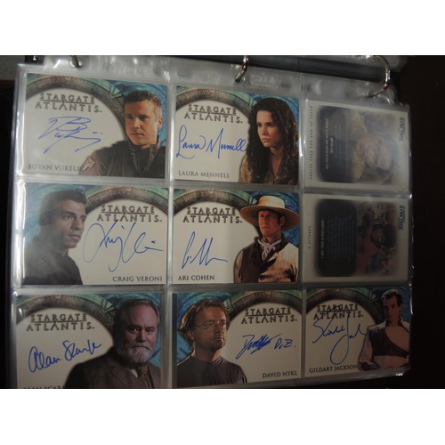 288 - Five albums containing Babylon 5, Stargate Atlantis, and Farscape trading cards, including some auto... 