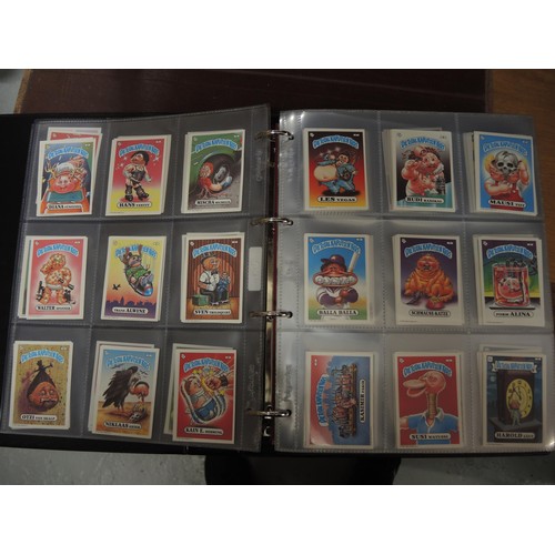 297 - Five albums of Topps trading cards, including A-Team, Dracula, New Kids on the Block, Neighbours etc... 