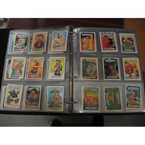 297 - Five albums of Topps trading cards, including A-Team, Dracula, New Kids on the Block, Neighbours etc... 