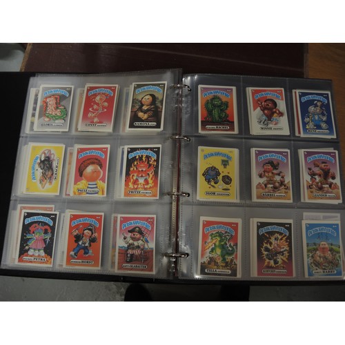 297 - Five albums of Topps trading cards, including A-Team, Dracula, New Kids on the Block, Neighbours etc... 