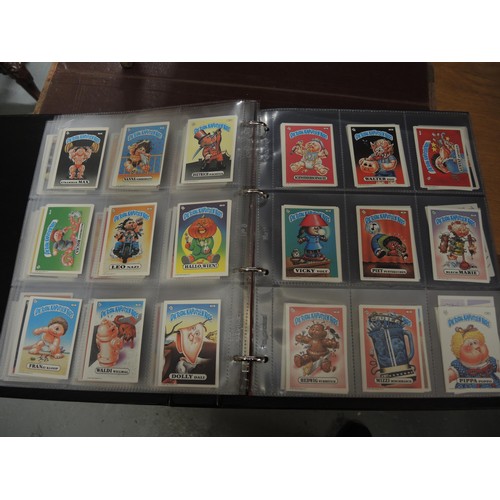 297 - Five albums of Topps trading cards, including A-Team, Dracula, New Kids on the Block, Neighbours etc... 