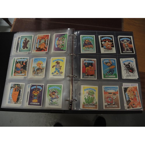 297 - Five albums of Topps trading cards, including A-Team, Dracula, New Kids on the Block, Neighbours etc... 