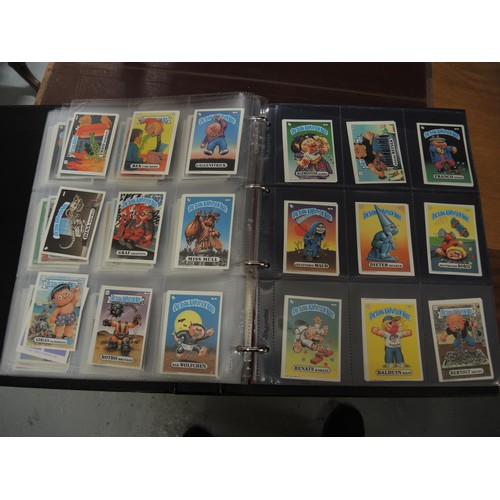 297 - Five albums of Topps trading cards, including A-Team, Dracula, New Kids on the Block, Neighbours etc... 