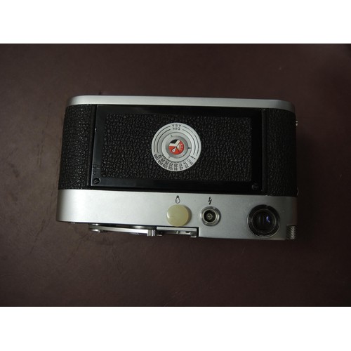 267 - Leica M3 camera outfit, serial number 984346 with original leather case, together with three lenses,... 