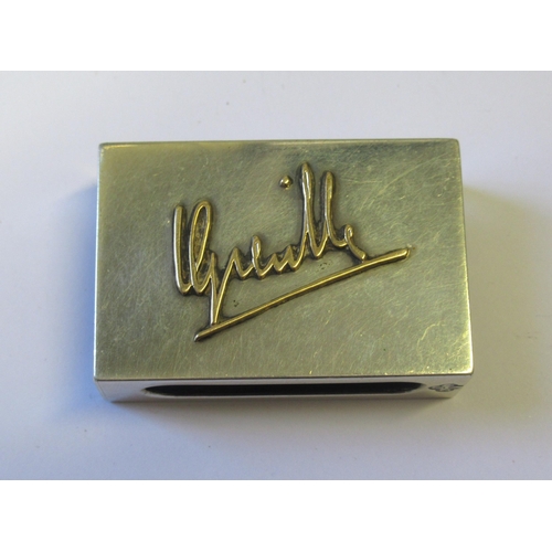 1061 - Asprey & Co. silver matchbox and cover, with applied gold inscription