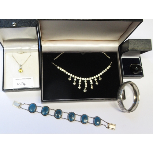 1074 - Swarovski pendant, paste set necklace and a small quantity of various silver jewellery in cases and ... 