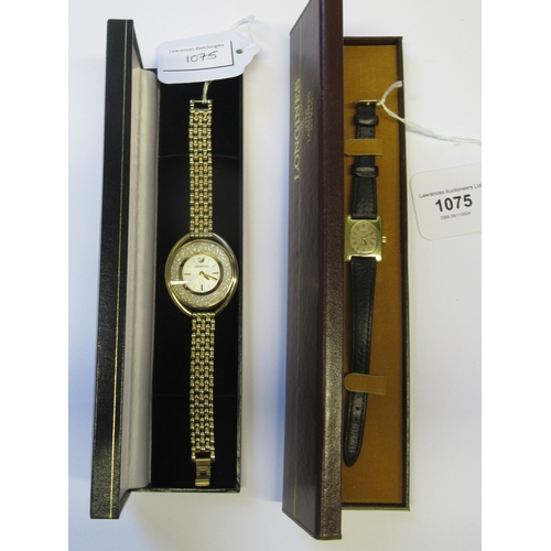 1075 - Longines ladies gold plated wristwatch with leather strap, in original box and a Swarovski gold plat... 