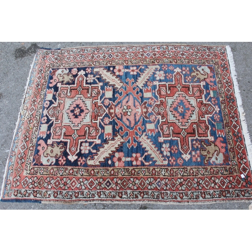 11 - Small Serabend rug with all-over Boteh design, 159 x 112cm, together with a small Heriz rug with twi... 