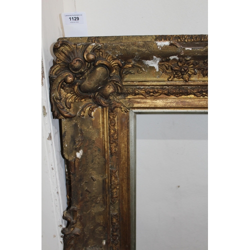 1129 - 19th Century gilt composition picture frame, aperture 72 x 59cm, rebate size 76.5 x 63.5cm