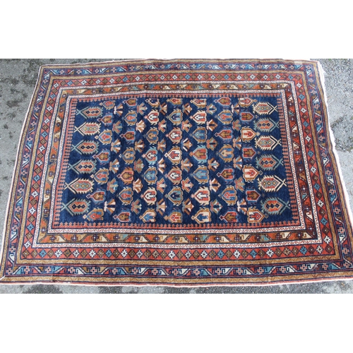 12 - Small Shirvan rug with an all-over Boteh design on a blue ground with borders, 144 x 109cm approxima... 