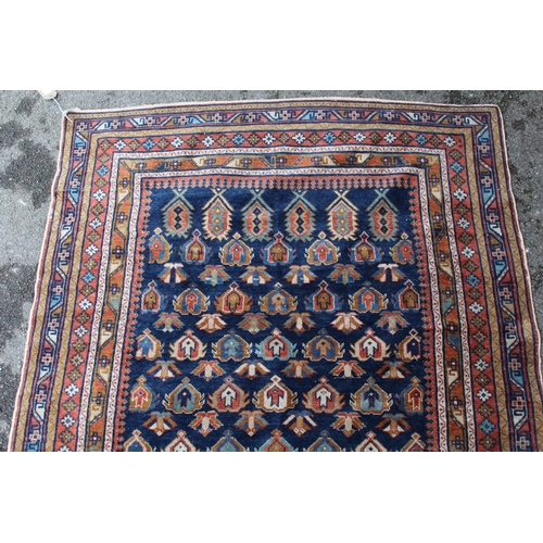 12 - Small Shirvan rug with an all-over Boteh design on a blue ground with borders, 144 x 109cm approxima... 