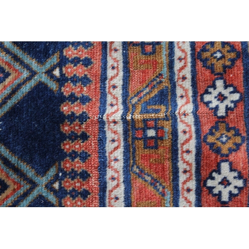 12 - Small Shirvan rug with an all-over Boteh design on a blue ground with borders, 144 x 109cm approxima... 