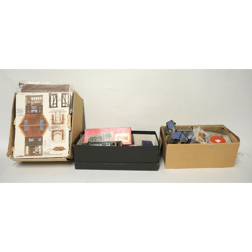 141 - Box containing a quantity of various railway ephemera including buildings, ' N ' gauge track, two ta... 