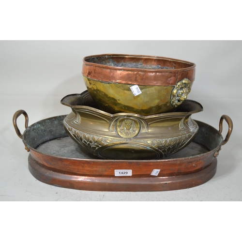 1429 - Oval 19th Century copper two handled cooking pan, brass jardiniere and a copper jardiniere