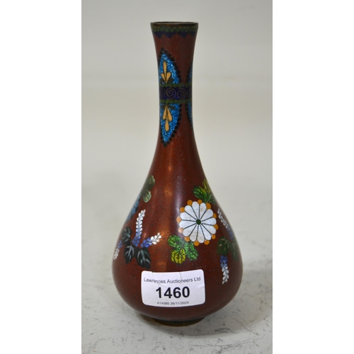 1460 - Small Japanese cloisonne bottle vase with stylised floral decoration on a rust ground, 19cm high