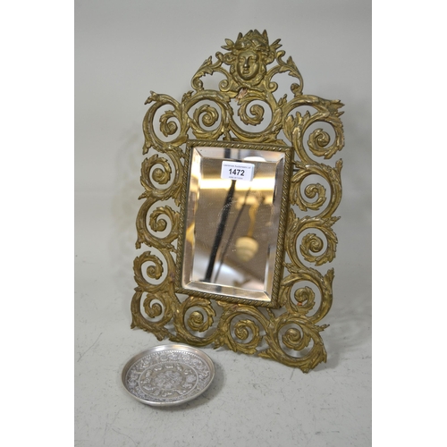 1472 - Brass table mirror with maskhead surmount, 37cm high, together with an oriental silvered metal circu... 