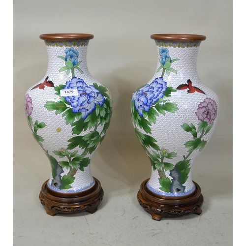 1479 - Pair of 20th Century cloisonne vases decorated with insects and chrysanthemums on hardwood stands, 4... 