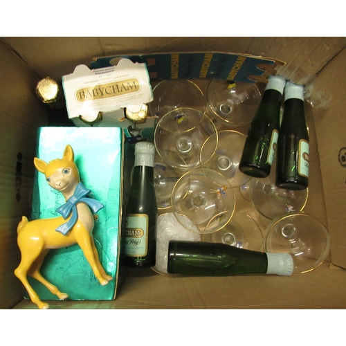 1572 - Miscellaneous Babycham related items including an advertising figure, boxed bottle and glass etc.