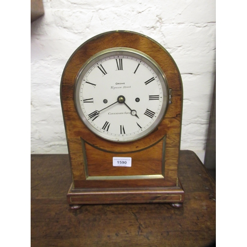 Regency rosewood and brass mounted bracket clock, the dome shaped case with bun feet, the circular painted dial with Roman numerals, signed Grohe, Wigmore Street, Cavendish Square, the two train fusee movement signed again to the back plate and striking on a bell, 35.5cm high