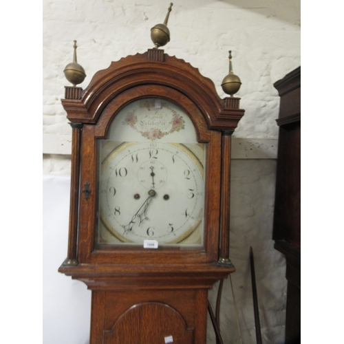 1596 - George III oak longcase clock, the broken arch hood with flanking pilasters above an arch panel door... 