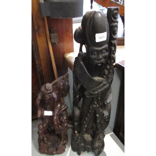 1625 - Dark carved hardwood root carving figure, 64cm high, together with a smaller root carving figure of ... 