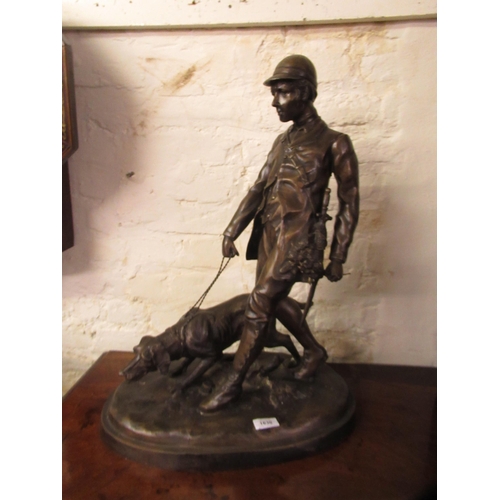 1630 - Late 20th / early 21st Century bronze patinated group of a huntsman with hound, 62cm high