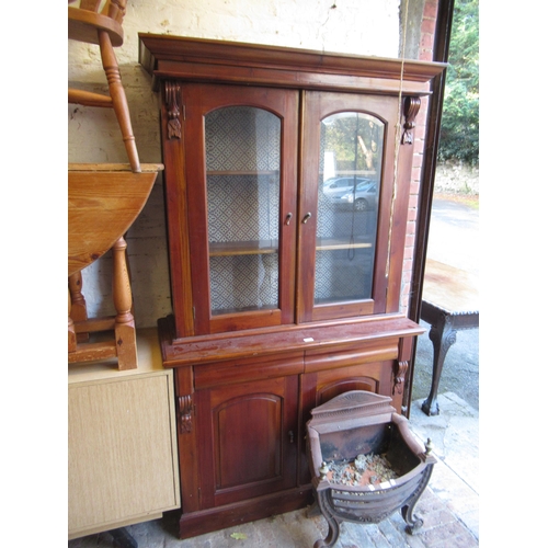 1655 - Reproduction mahogany bookcase, the moulded top above two arched top glazed doors, two frieze drawer... 