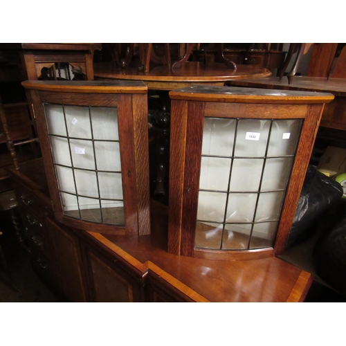 1658 - Pair of early 20th Century oak bow fronted wall cabinets with leaded glass doors, 42cm wide x 57cm h... 